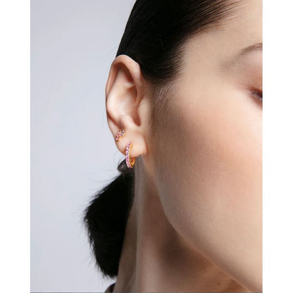 Close-up of woman wearing VICEROY JEWELS Mod. 9129E100-37 silver 925° multifunction quartz analog earrings