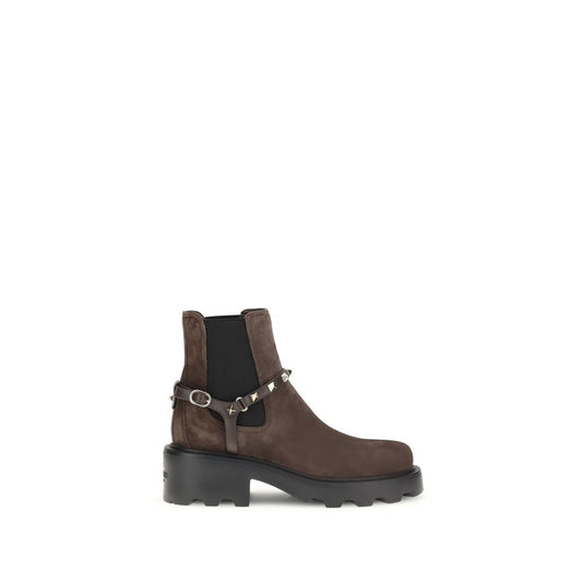 Valentino Garavani Brown Calf Leather Bos Taurus Chelsea Boots with studs and strap detail, featuring a rugged lug sole for AW25.