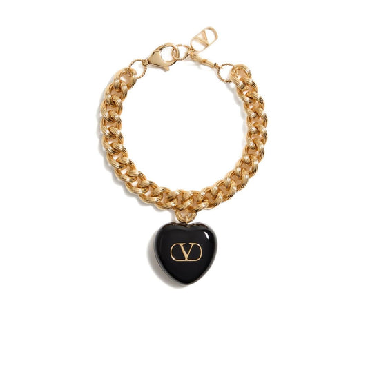 Valentino Garavani Coeur Royal Bracelet with black heart charm, logo engraving, and chunky chain design.