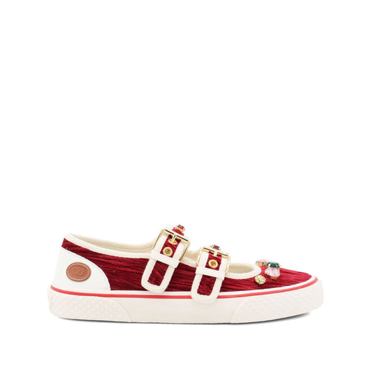 Valentino Garavani Jewel-embellished buckle sneakers in dark red velvet with double buckle fastening and jewel accents.