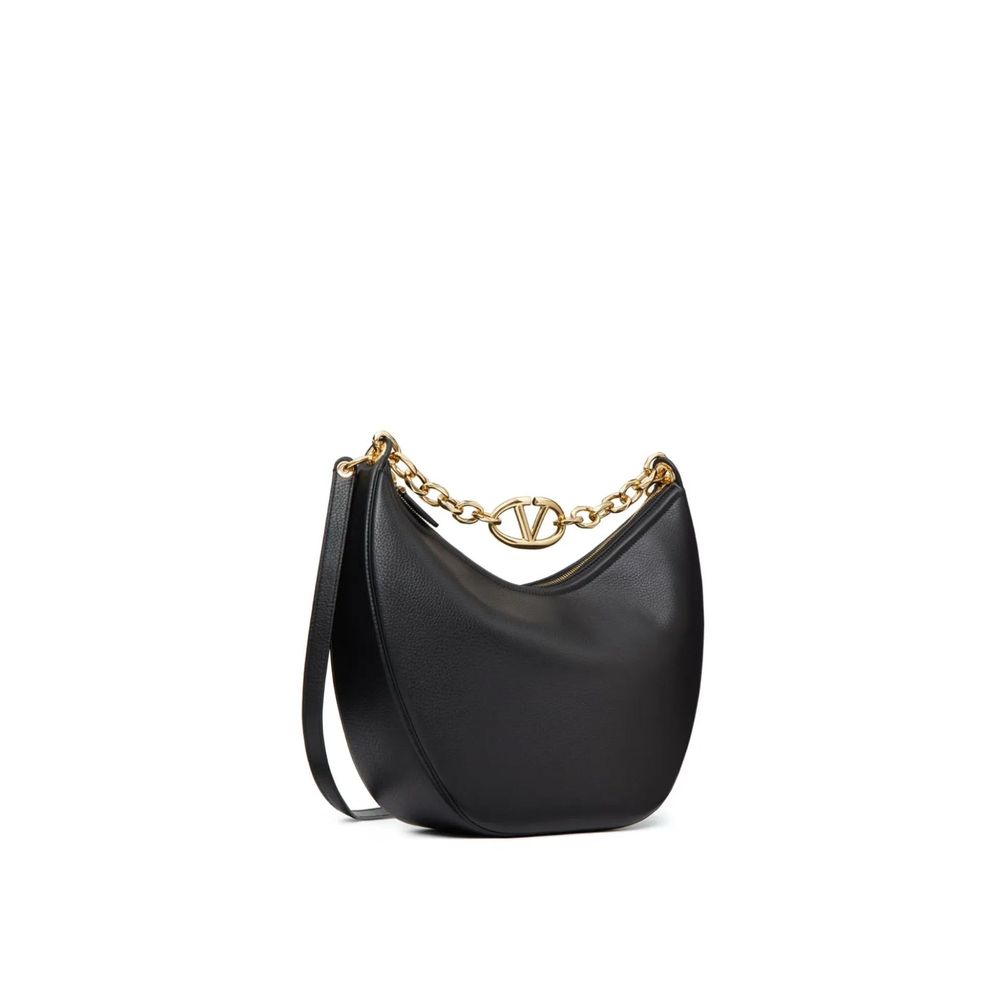 Front view with bag zipped and handles upright.