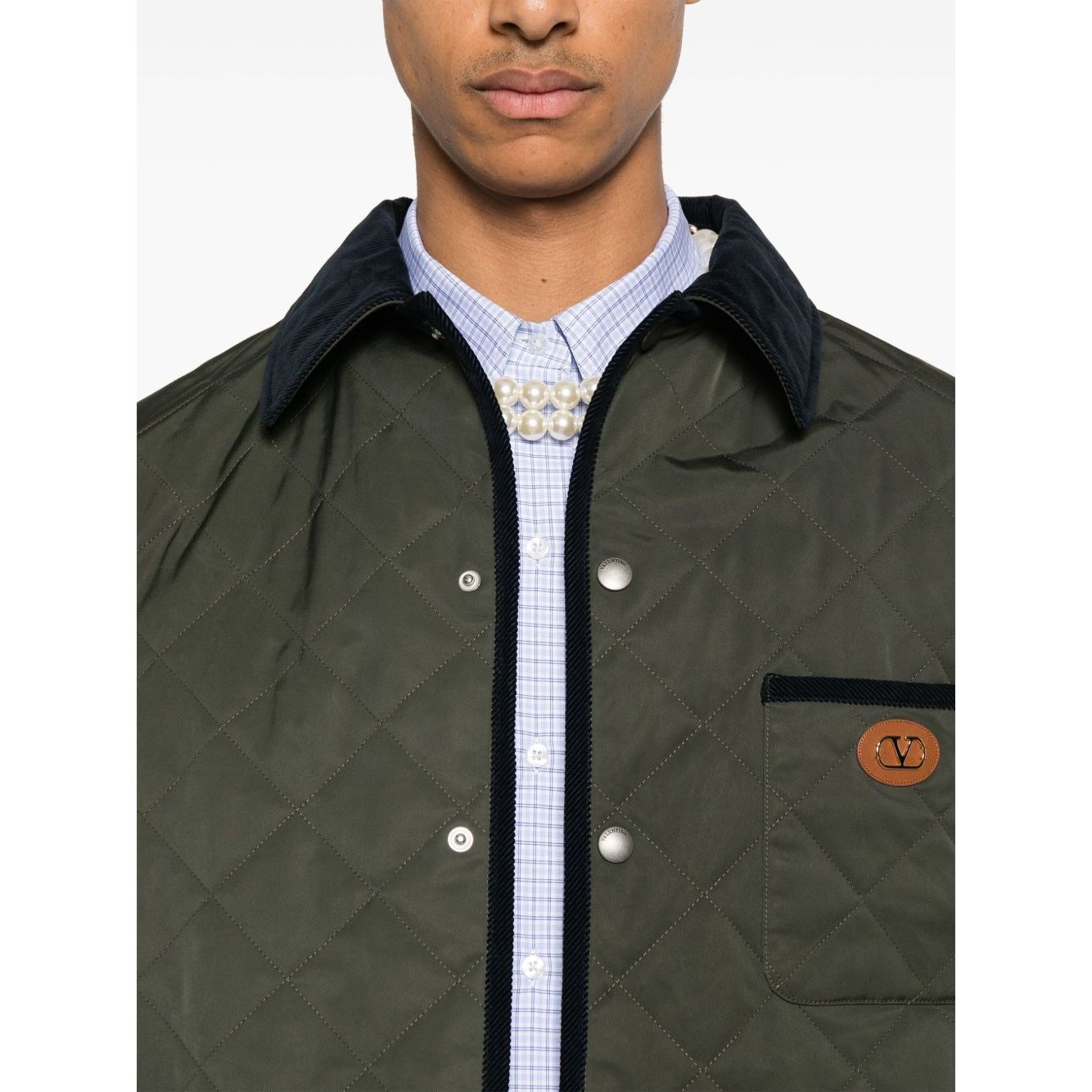 Valentino Vlogo Signature quilted jacket in olive green with front press-stud fastening and contrasting trims.