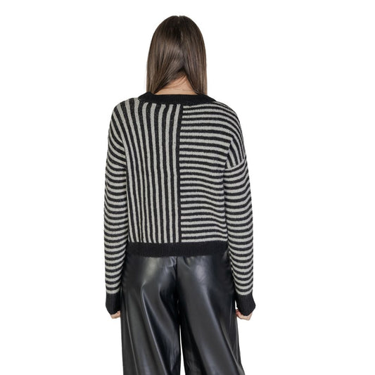 Back view of Vero Moda Black And White Recycled Polyester Sweater showcasing striped knit design for women in fall/winter collection.