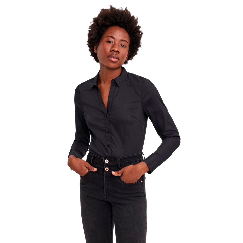 Woman wearing Vero Moda Black Cotton Bodysuit for a stylish, elegant look.