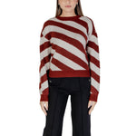 Vero Moda Bordeaux Recycled Polyester Sweater worn by a woman, featuring a red and white striped pattern, perfect for fall/winter.