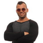 Unisex metal sunglasses WEB MOD. WE0270 5333Z worn by model, packaged with official box for stylish and secure wear.