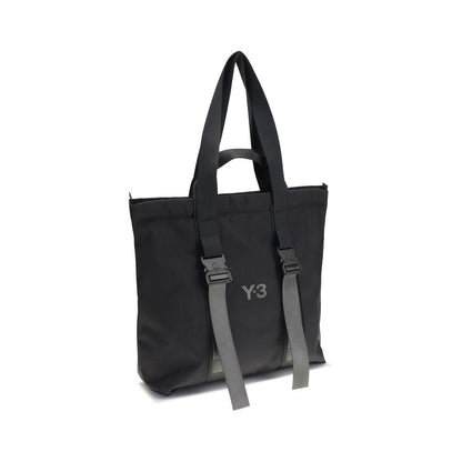 Y-3 Black Nylon Shoulder Bag with top handles and logo, featuring a secure zippered closure and ample interior space for easy organization.